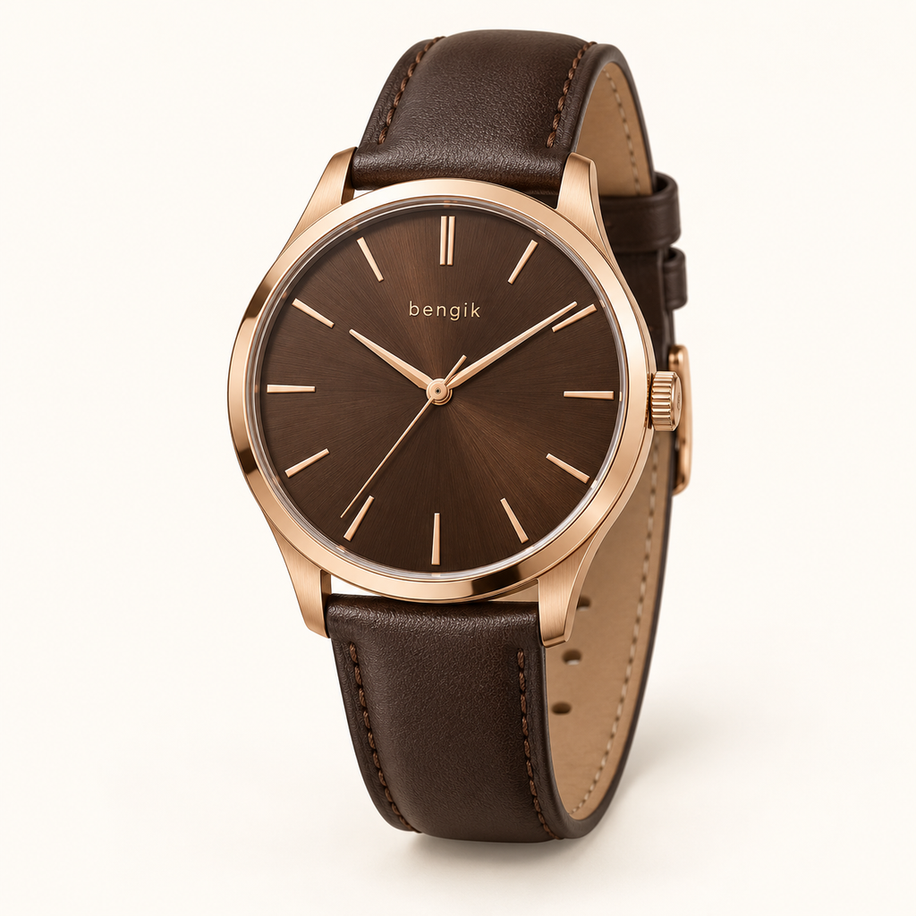 bengik Copperline watch: round rose-gold-tone case, walnut-brown dial, slim baton markers and dark brown leather-look strap, main three-quarter view.