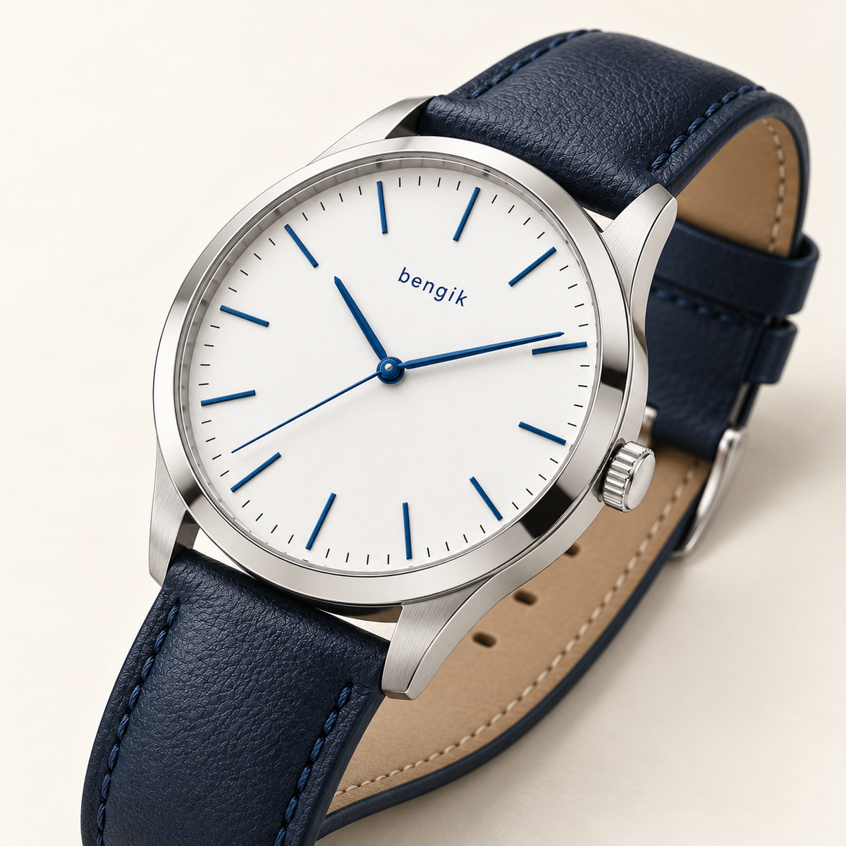bengik Horizon watch: round silver-tone case, white dial, blue baton markers and navy leather-look strap, diagonal detail view.