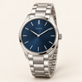 bengik Meridian watch: round silver-tone case, midnight-blue dial, slim baton markers and silver-tone link bracelet, main three-quarter view.