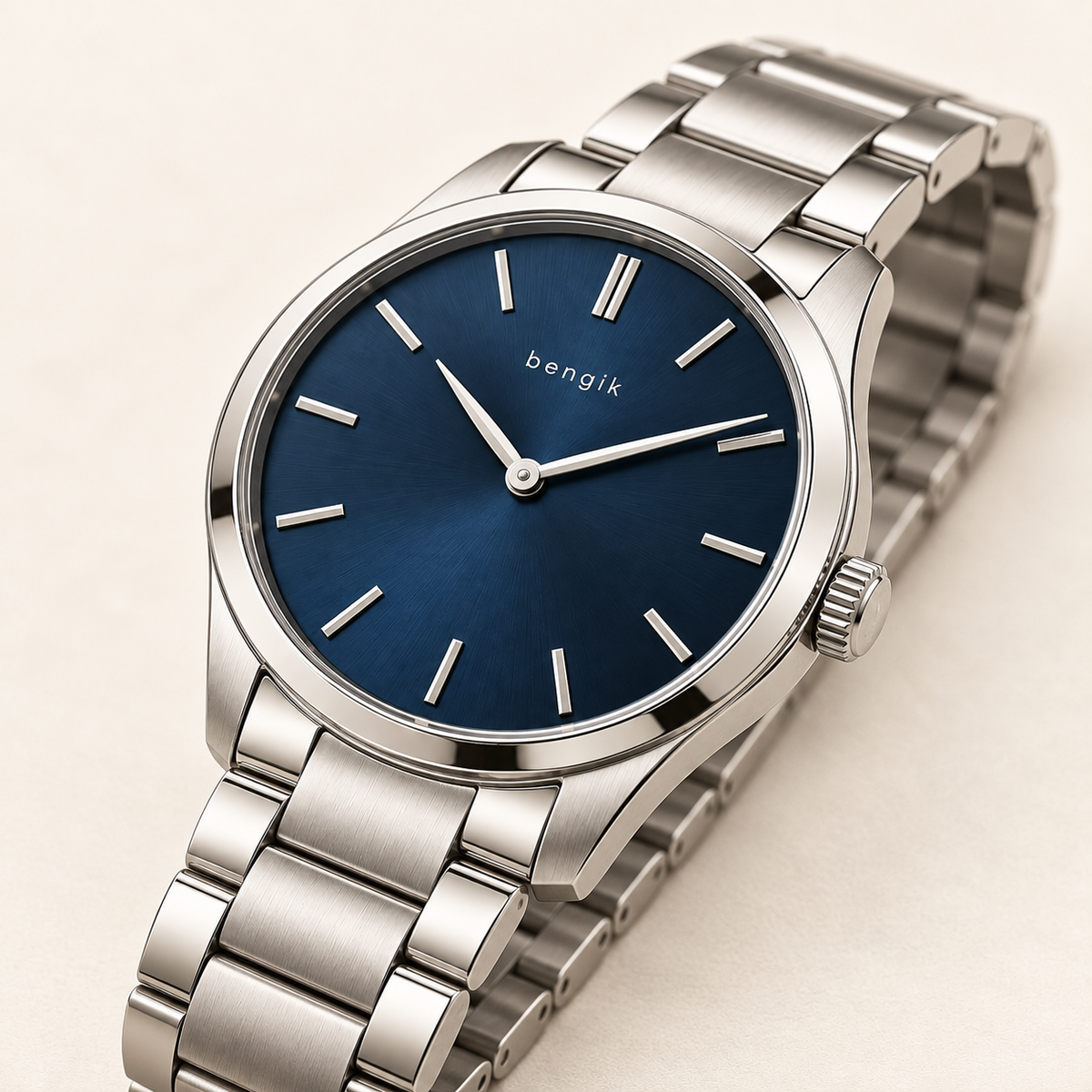 bengik Meridian watch: round silver-tone case, midnight-blue dial, slim baton markers and silver-tone link bracelet, diagonal detail view.